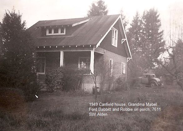 1949 Canfield house. Grandma Mabel Ford Babbitt and Robbie on porch.