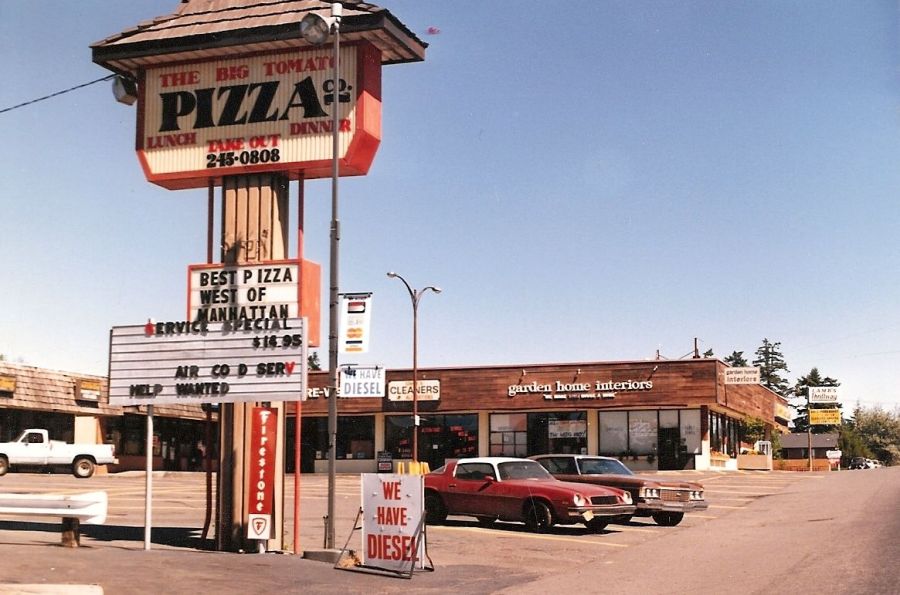 1994 photo of the Big Tomato Pizza Company sign in the parking lot of Lamb's Thriftway shopping plaza.