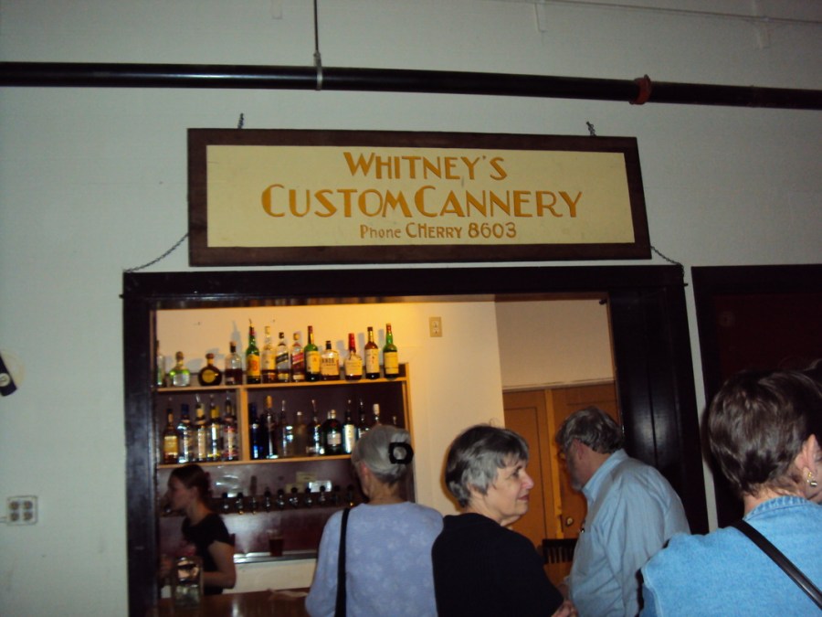 Whitneys Custom Cannery sign hanging in the Old Market Pub and Brewery