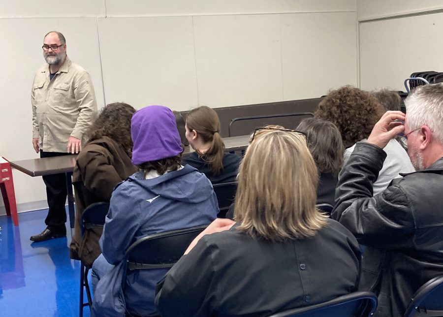 Andrew Shreve presenting the Search for Cora